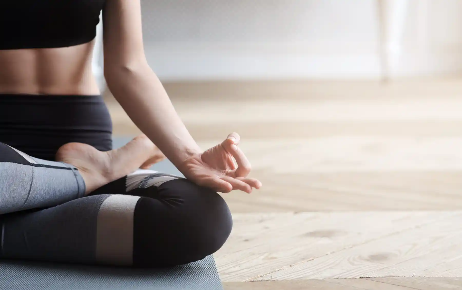 Young female doing yoga | Santosh Yoga Institute in Salt Lake City, UT