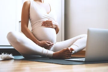 Young woman doing yoga for Healthy Pregnancy in Salt Lake City, UT | Santosh Yoga Institute