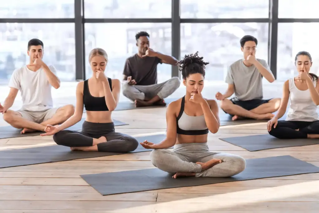 Group of people doing Alternate Nostril Breathing in Salt Lake City, UT | Santosh Yoga Institute