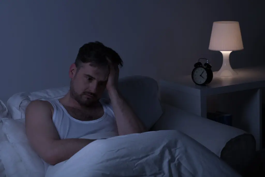 Stressed man not getting sleep at night in Salt Lake City, UT | Santosh Yoga Institute