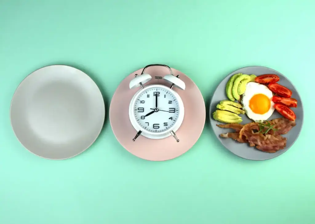 Healthy food and clock on table in Salt Lake City, UT | Santosh Yoga Institute